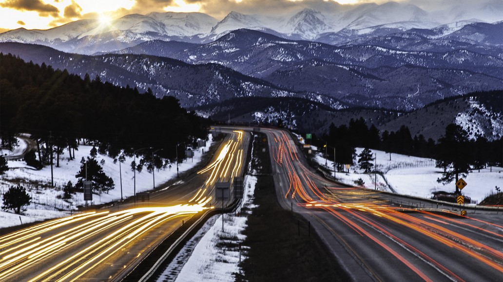 Car Trail at Sunset in Mountains